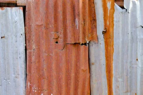 Old and rusty damaged galvanized iron texture. Stock Photos