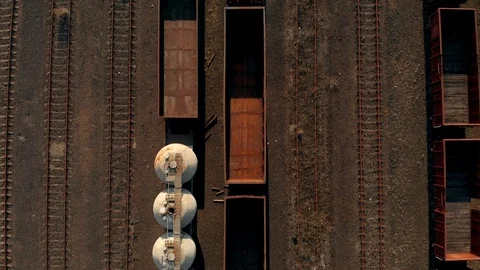 Old and rusty industrial train tracks drone shot Stock Footage 89882314