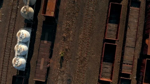 Old and rusty industrial train tracks drone shot Stock Footage 89894524