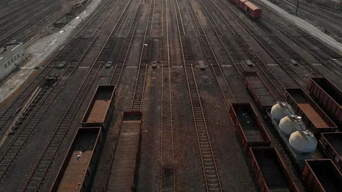 Old and rusty industrial train tracks drone shot Stock Footage 89894786