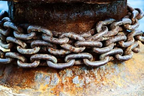 Old and rusty mooring post Stock Photos