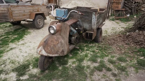 Old and rusty moped with trailer Video stock 258892699
