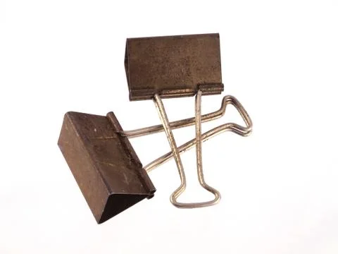 Old and rusty paper clips. Stock Photos