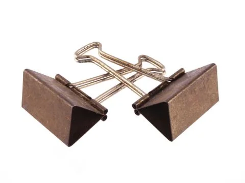 Old and rusty paper clips. Stock Photos