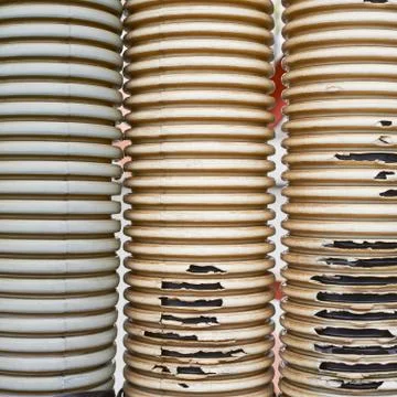Old and threadbare plastic tubes Stock Photos