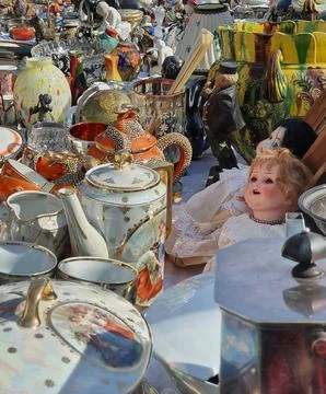 Old and used items displayed for sale at the flea market Stock Photos