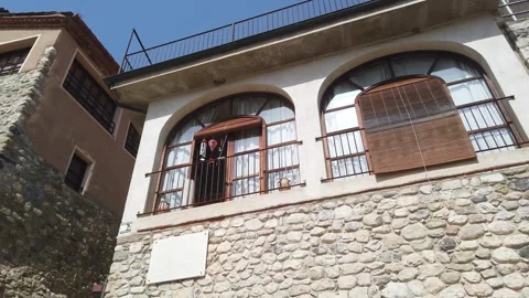 Old and well cared house at summer with wind chimes Stock Footage 255940245