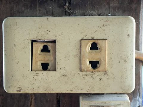 Old and worn electrical outlets Stock Photos