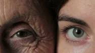 Old And Young Eye - Grandmother And Granddaughter Looking Together At Camera Stock Footage