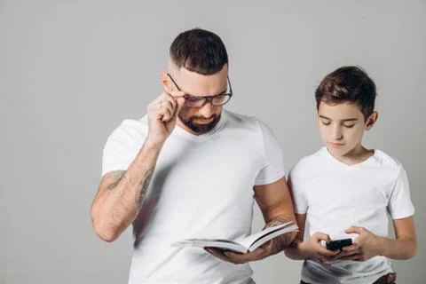 Old and young generation. different interests Stock Photos