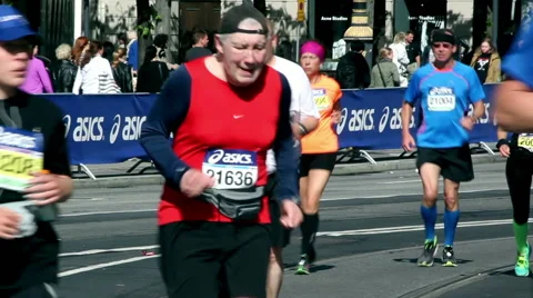 Old and young running the ASICS Stockholm Marathon Stock Footage 45161343