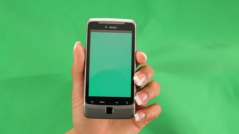 Old Android cell phone. Black female hands. Green screen B Stock Footage 121806538