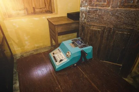Old antique cash register, adding machines or antique calculator in old conve Stock Photos