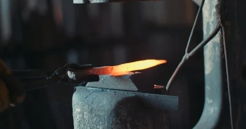 Old antique machine hammering red hot iron Stock Footage 105305406