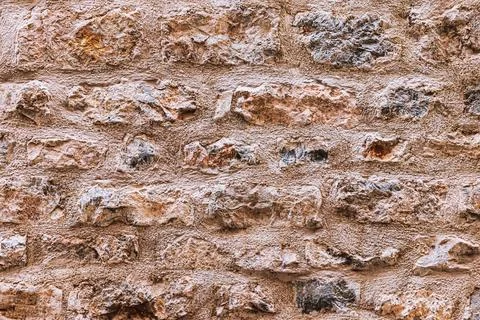 Old antique stone wall texture. Stock Photos