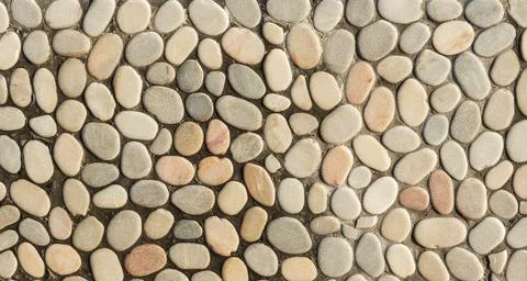 Old antique stone wall texture. Abstract background. Stock Photos