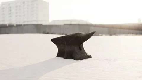 Old anvil on a sandy beach Stock Footage 235630151