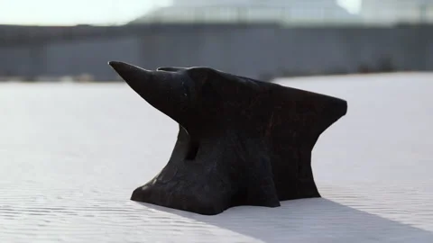 Old anvil on a sandy beach Stock Footage 236841034