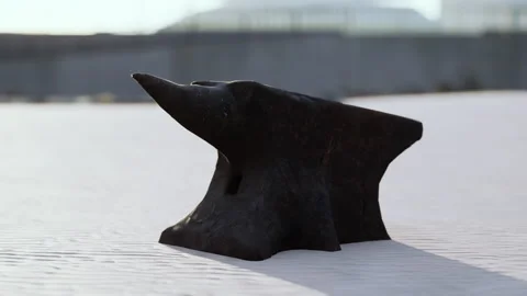 Old anvil on a sandy beach Stock Footage 237887491