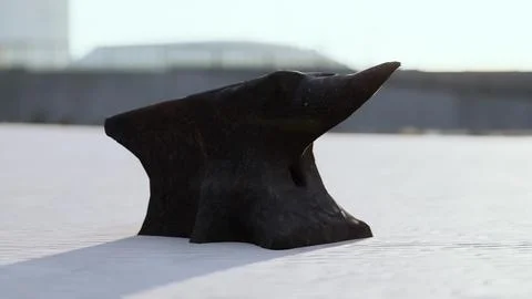 Old anvil on a sandy beach Stock Illustration