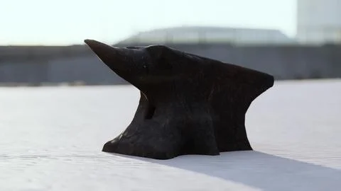 Old anvil on a sandy beach Stock Illustration