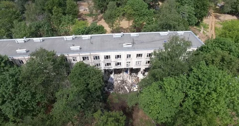Old apartment block collapse after destructing with excavator Stock Footage 124621838
