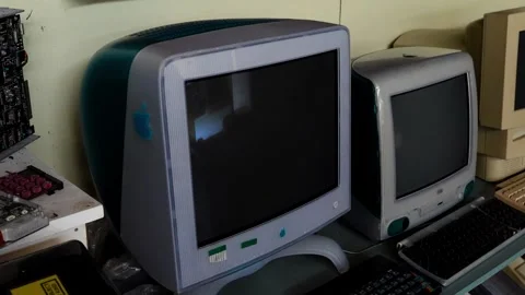 Old Apple Mac computer displays from different eras at tech exhibition. Stock Footage 295205500