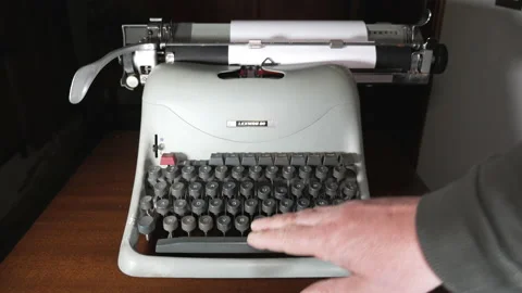 Old appliances, using a mechanical typewriter Stock Footage 152683054