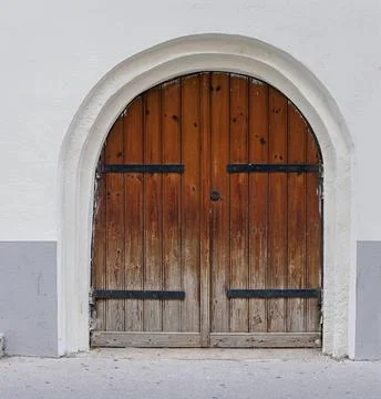 Old arch door Stock Photos