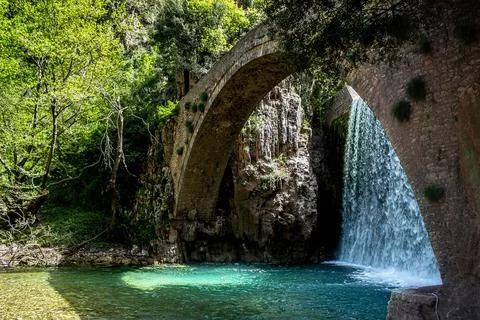 Old arch stone bridge Stock Photos