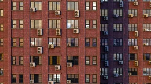Old architecture background red brick building apartment air conditioning w.. Ilustración de archivo