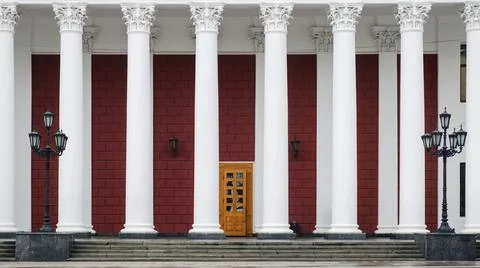 Old architecture building facade with large white columns Stock Photos