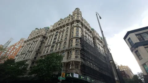 Old architecture towers over the corner of west 74th Street in Midtown Manhattan Video stock 220565706