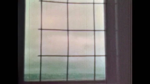 Old archive, metal mesh on window, inside view. Close up, Historical film of Stock Footage 282184117