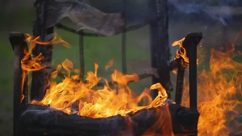 The old armchair is on fire Stock Footage 75451425