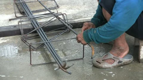 Old Asian Man Tying Wire On Rebar 스톡 동영상 12324424