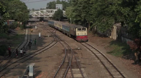 Old Asian Train Approaching Camera - Yangon, Burma Stock Footage 56632520