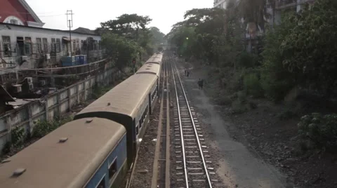 Old AsianTrain Passing By Wide Shot (Yangon/Burma) Stock Footage 56632453