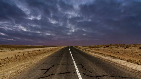 Old asphalt road at sunset background Stock Footage 104625334