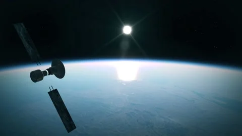 Old astray satellite breaking apart in space forming space debris in orbit Stock Footage 159155196