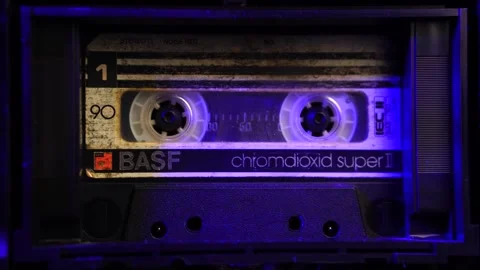 Old Audio Cassette Tape Spinning in Boombox, Close Up Stock Footage 296230596