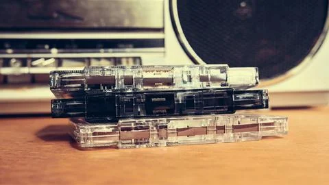 Old audio cassettes on the table close-up Stock Photos