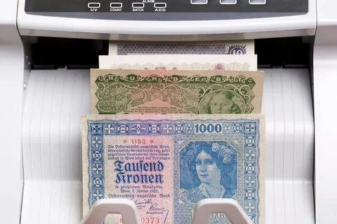 Old Austrian crown in the counting machine Stock Photos