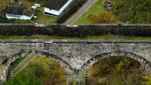 The old Austrian stone railway bridge viaduct in Ukraine Stock Footage 172582273