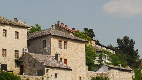 Old authentic stone houses in Mostar, in Bosnia Stock Footage 241614866
