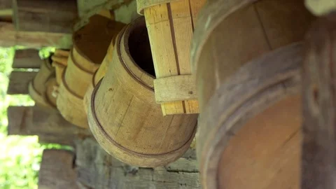 Old Authentic Wooden Buckets Hang On The Wall Of Wooden House Stock Footage 98347553