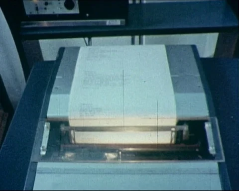 OLD AUTOMATIC TYPEWRITER IN 1960S DATA CENTRE (archive footage) Video stock 92351845