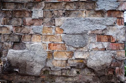 Old background with rough red bricks, grunge rough wall surface, dirty weathe Stock Photos