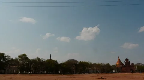 Old Bagan hyperlapse city life with Shwezigon Pagoda view afar Stock Footage 61404535