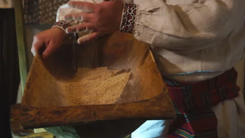 The old baker's hands take the flour Stock Footage 145376444